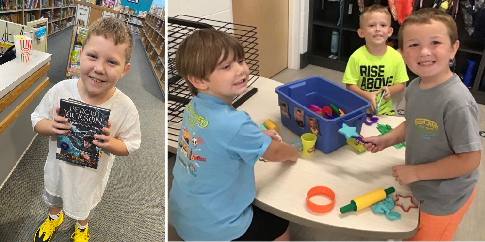 Boy holding a book and 3 other boys playing with play-doh