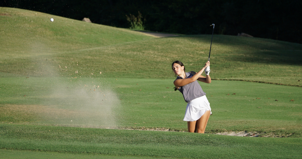 Saylor Johnson hitting golf shot