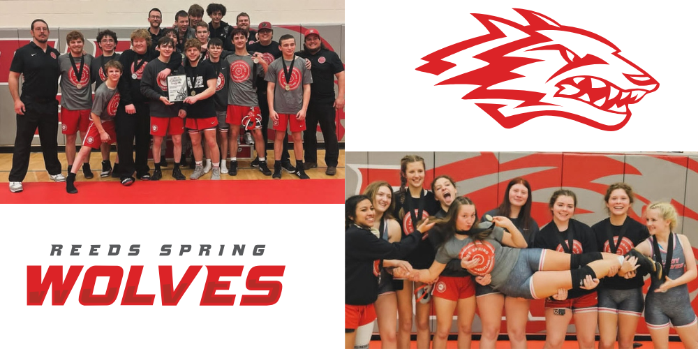 wrestlers holding plaques