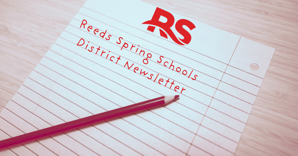 a piece of paper with a red colored pencil with the words Reeds Spring School District Newsletter written out