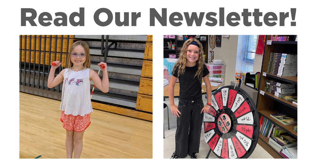 A girl is jumping rope, while another stands next to prize wheel.