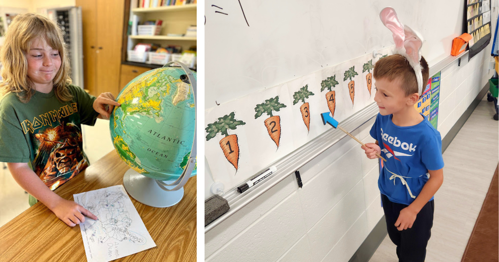 Student pointing at globe while another points to white board.