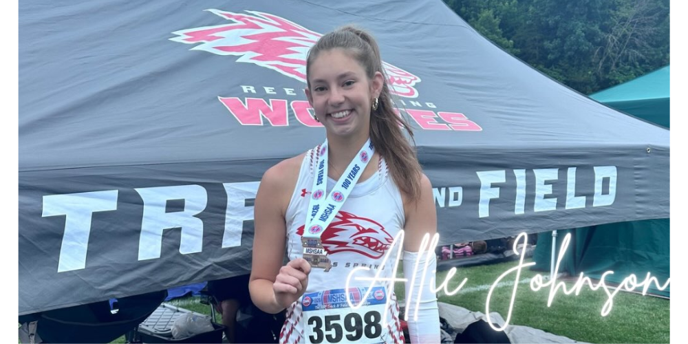 Allie Johnson with medal around her neck