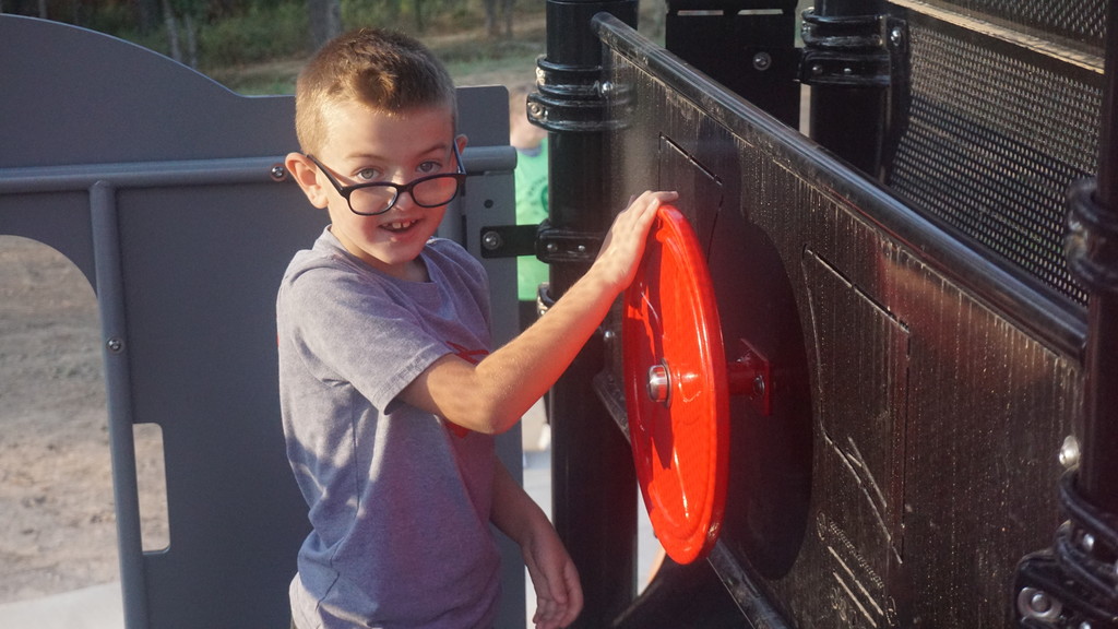boy driving the train