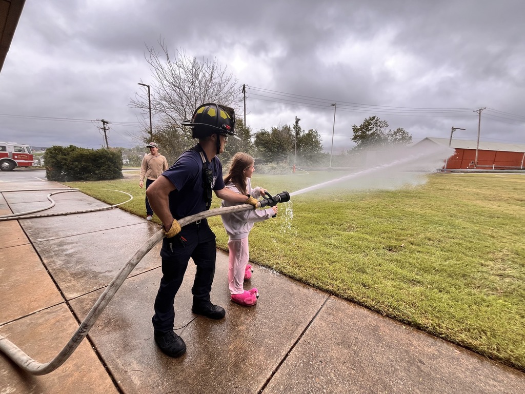 spraying fire hose