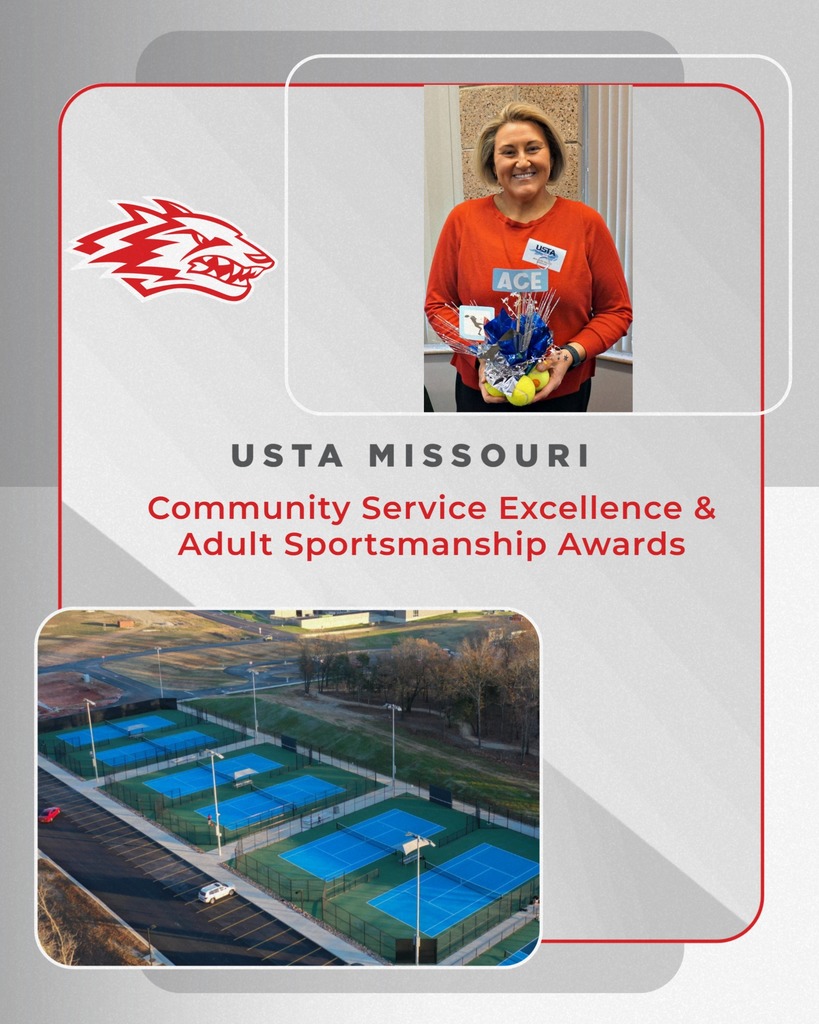 Katie Wilson holding award