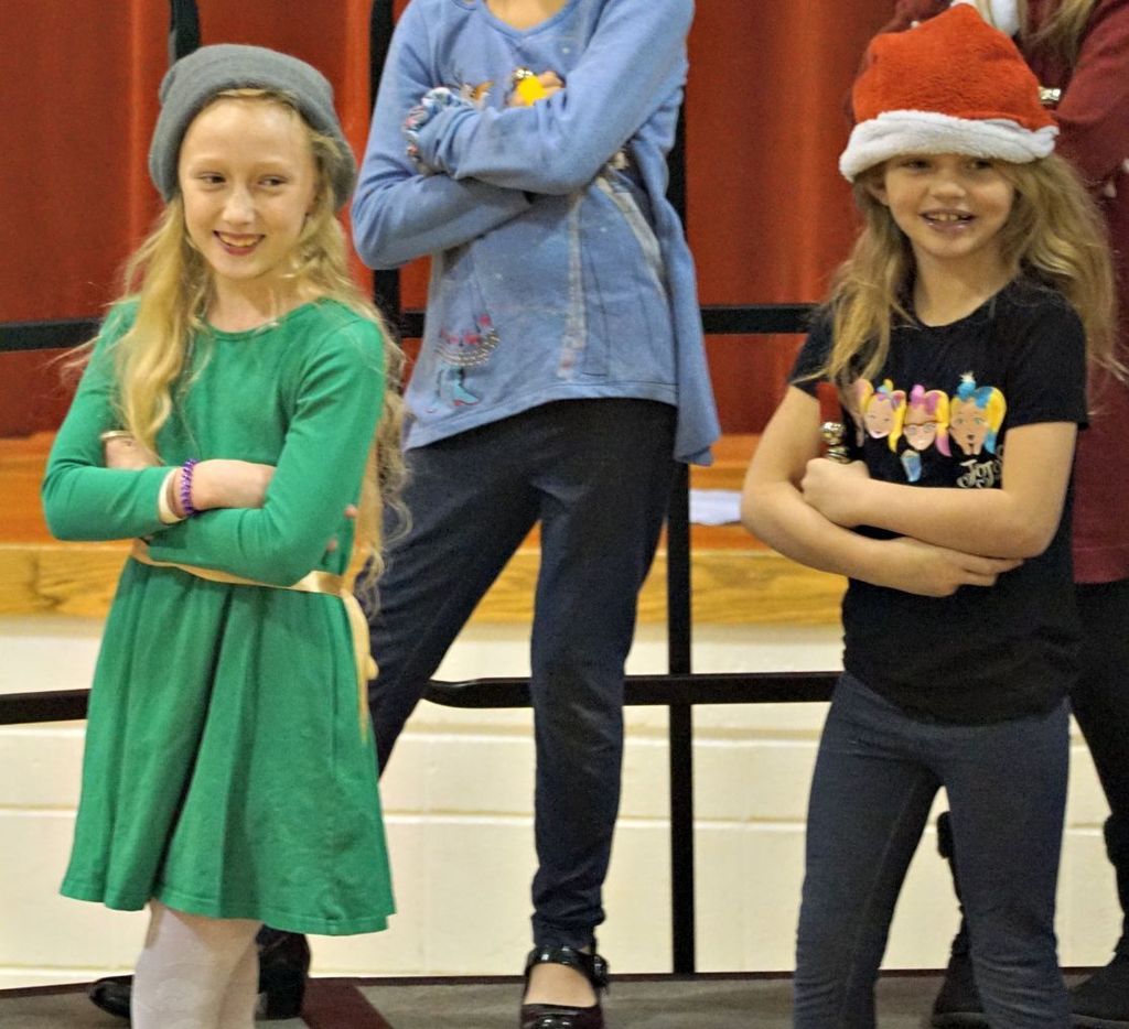 arms crossed and smiling