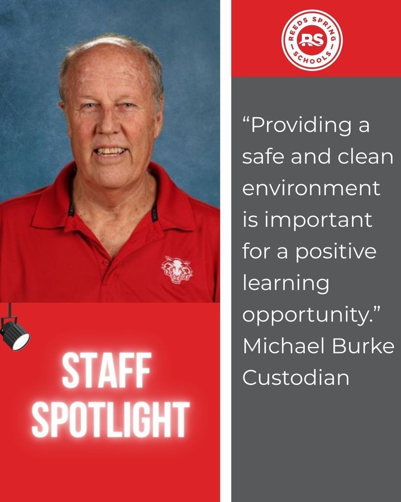 man in red shirt smiling