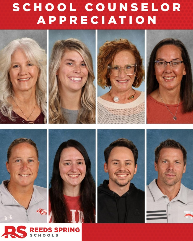 8 counselors smiling at camera