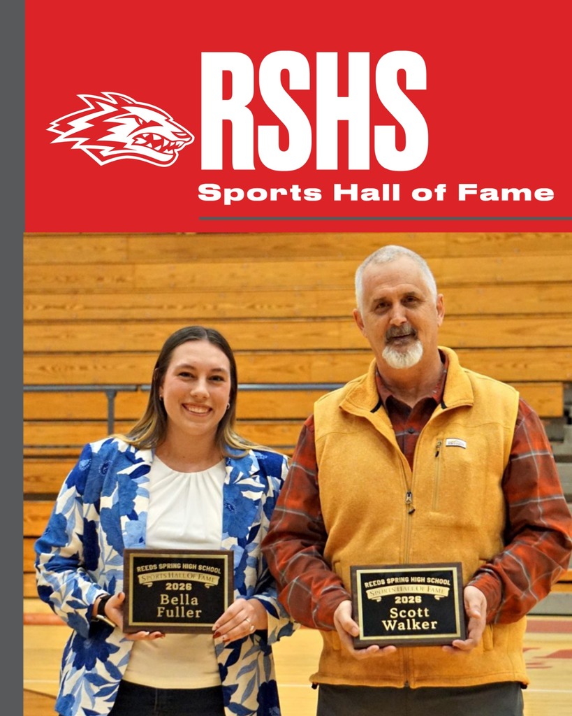 woman and man holding plaques