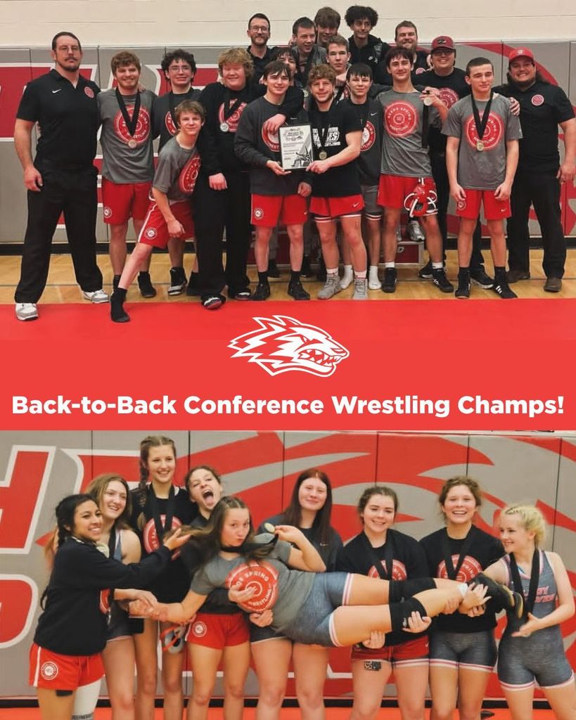 wrestling team holding plaque