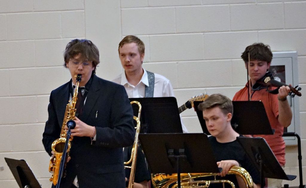student playing saxophone