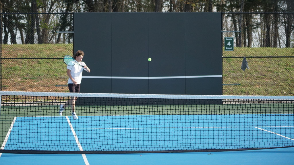 Hoyt Gubin hits ball