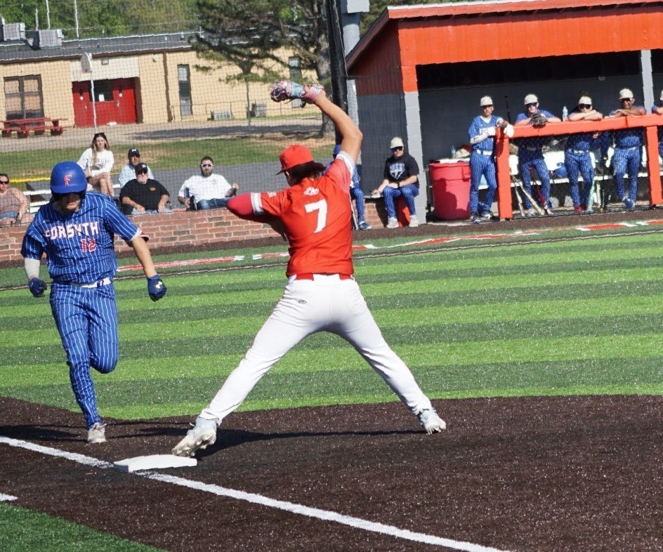 first baseman stepping on the bag