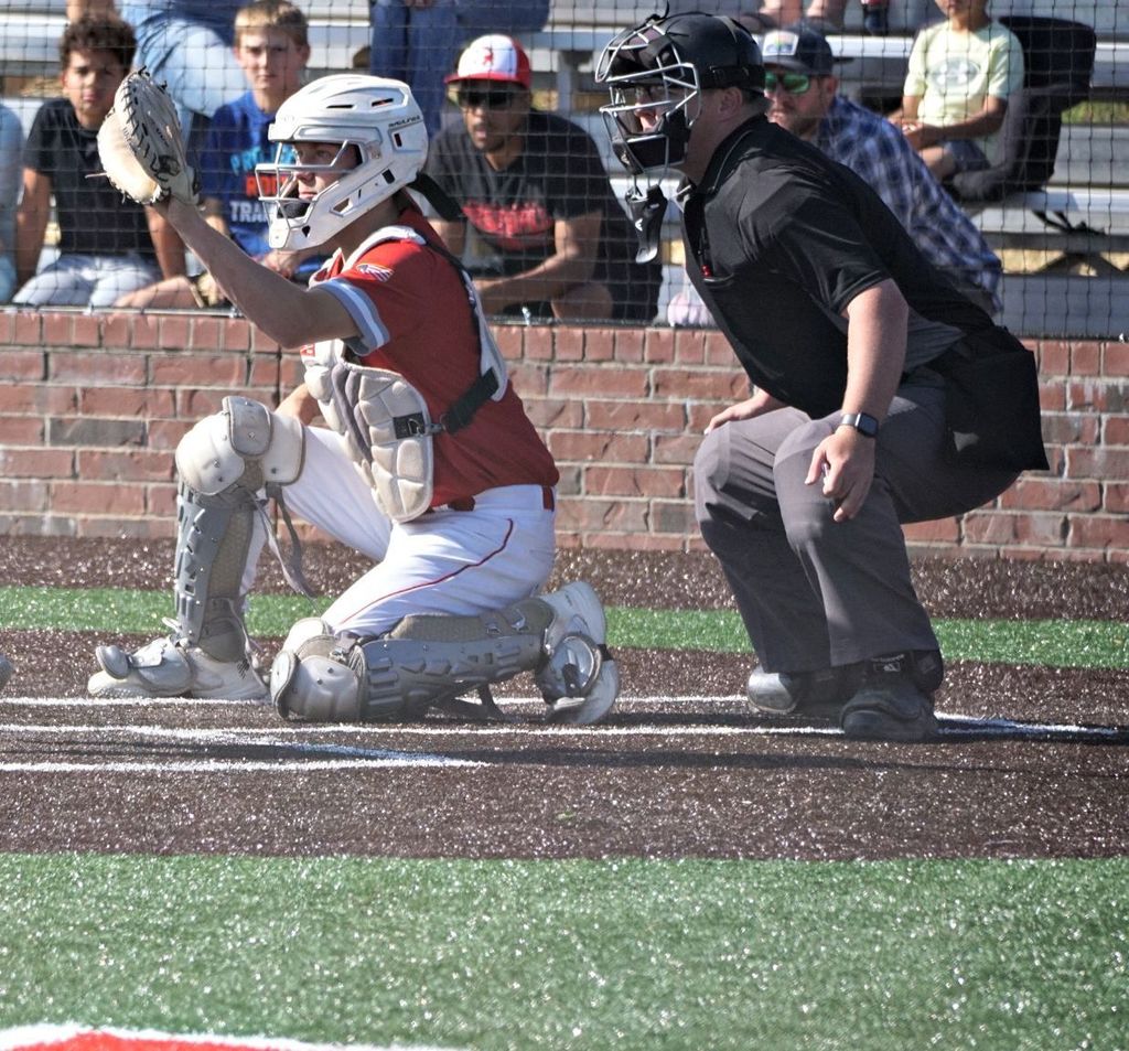 catcher receiving pitch