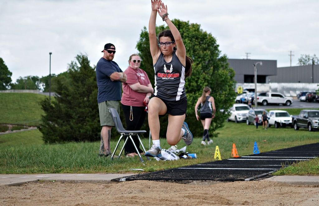 girl triple jumping