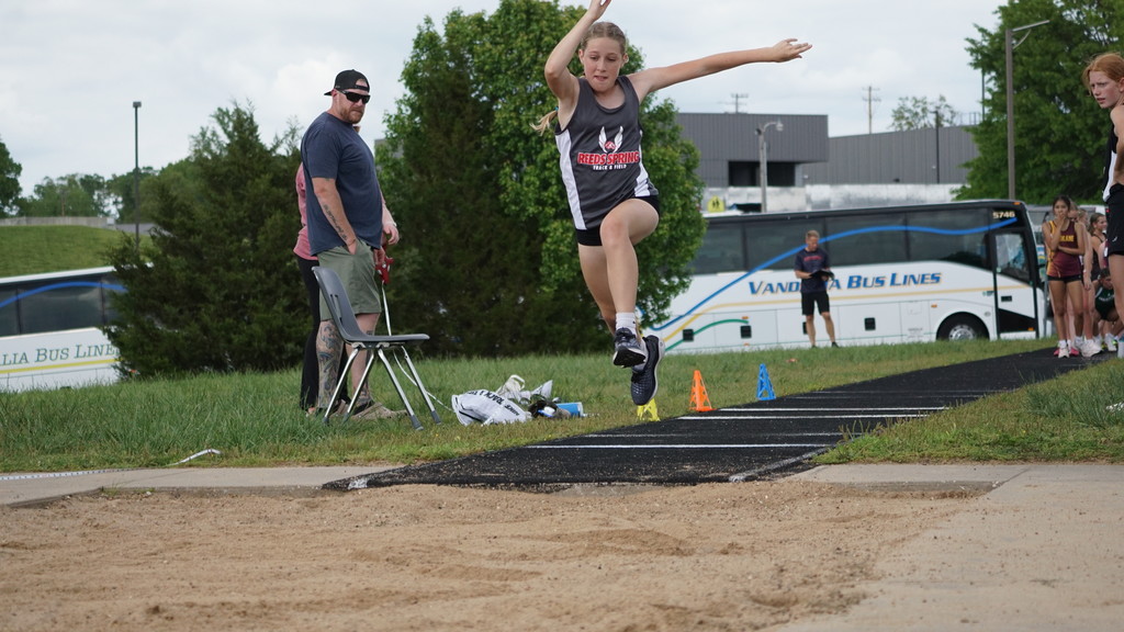 girl triple jumping
