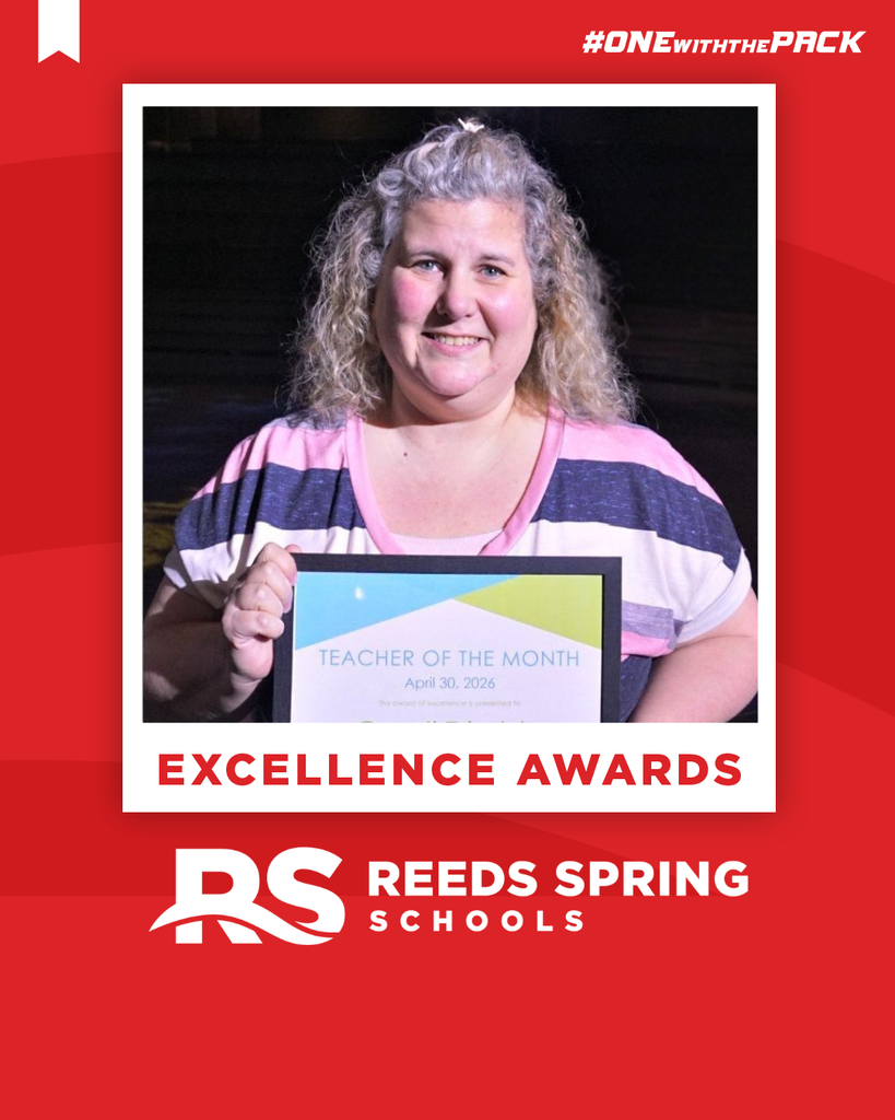 Cyndi Trimble holding a certificate