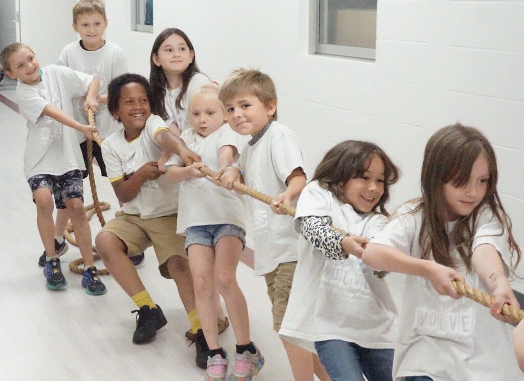 students playing tug of war