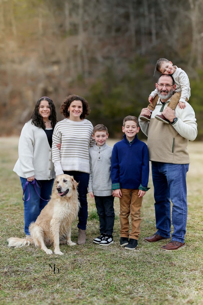 Yuliana Morales-Schafer with four kids, husband, and dog