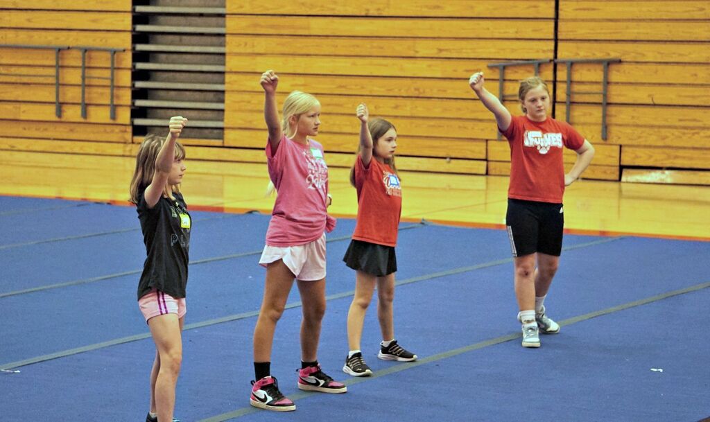 Girls practicing cheerleading