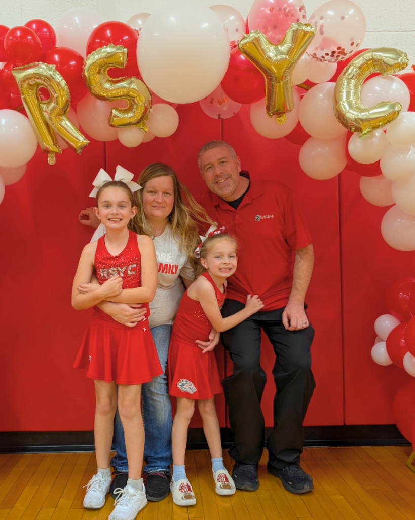 Kami Reed with husband and two daughters