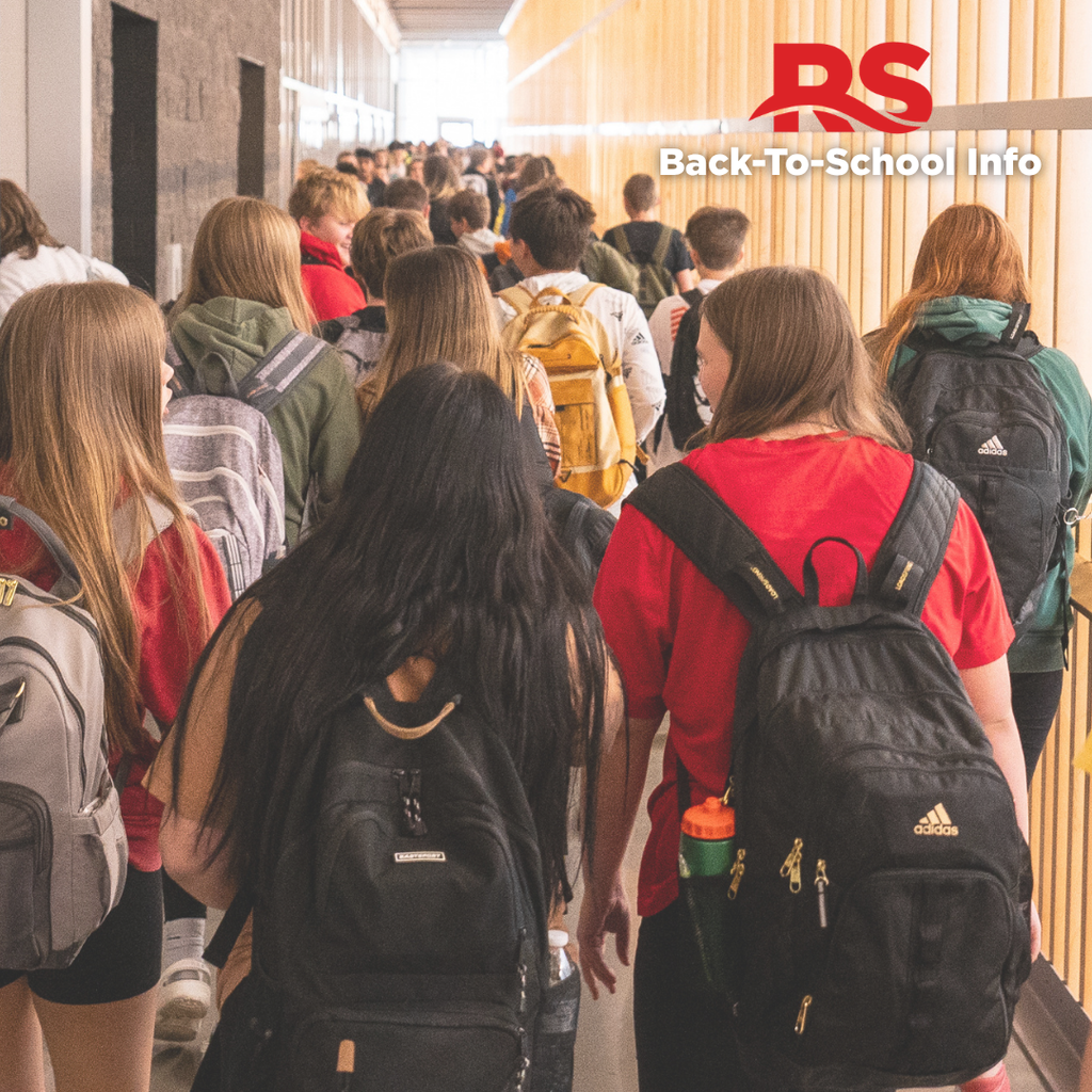 students walking down middle school hallway