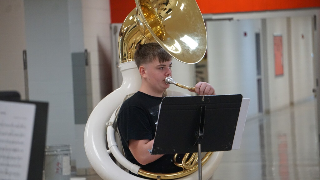 Boy playing sousaphone