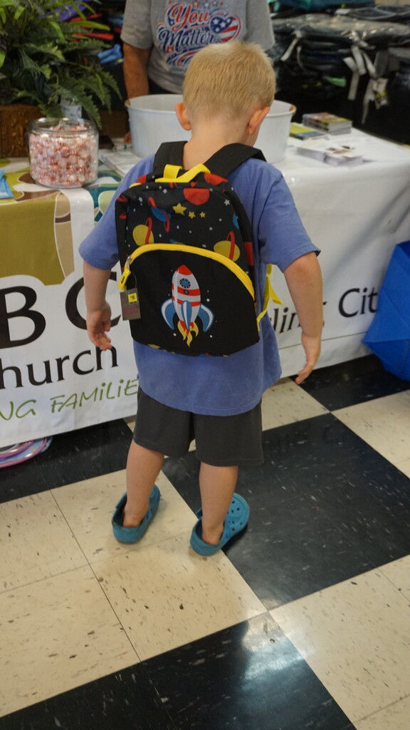 Boy wearing a backpack