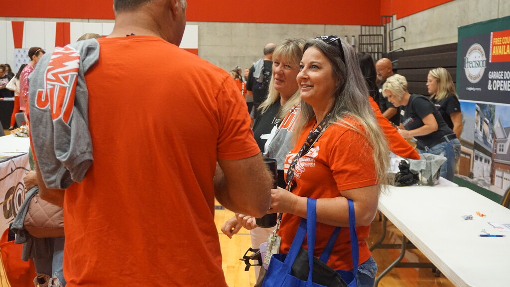 Ms. Jenn and Ms. Brenda talking to Mr. Essick