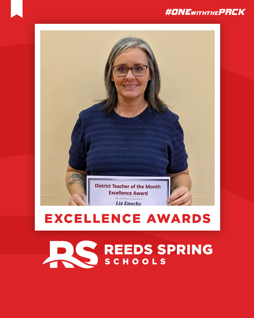 Liz Enochs holding a certificate