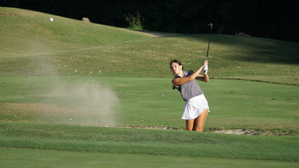 Saylor hitting out of the bunker.