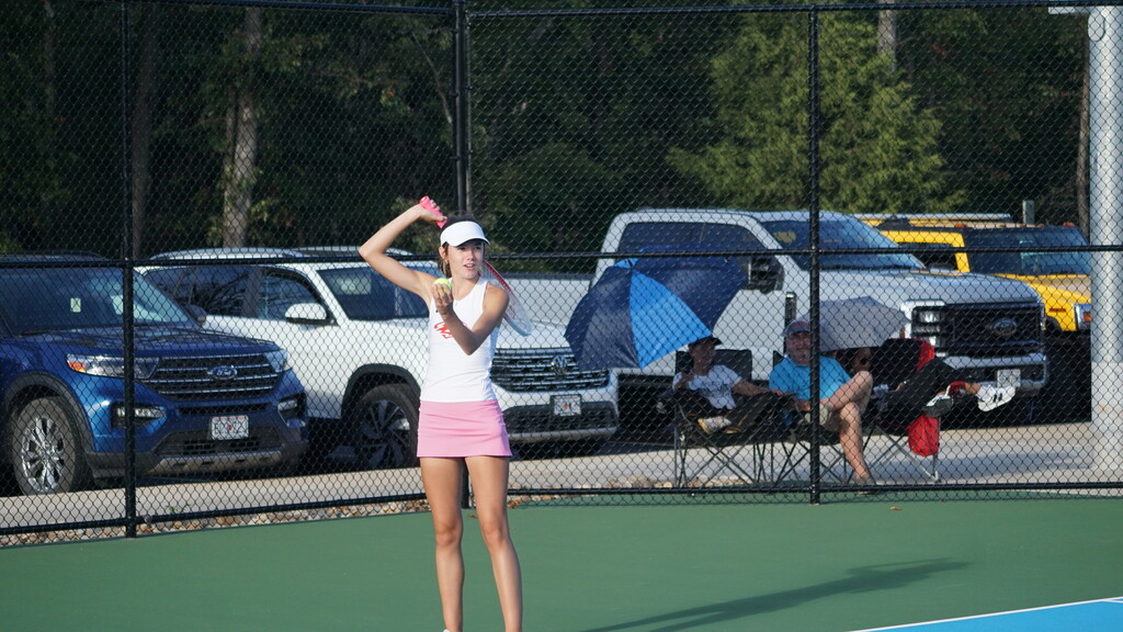 Issie getting ready to serve.