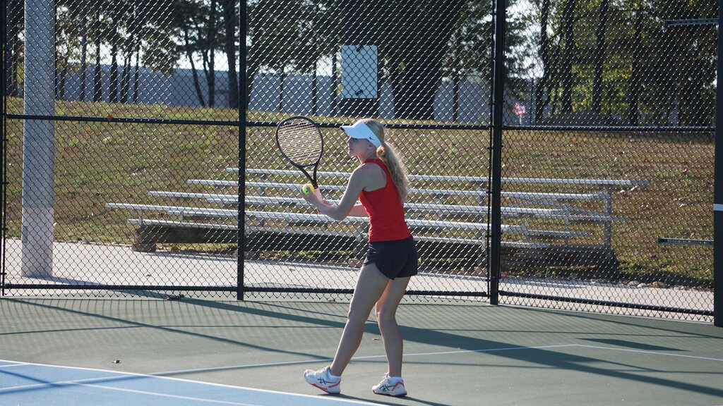 Vera prepares to serve