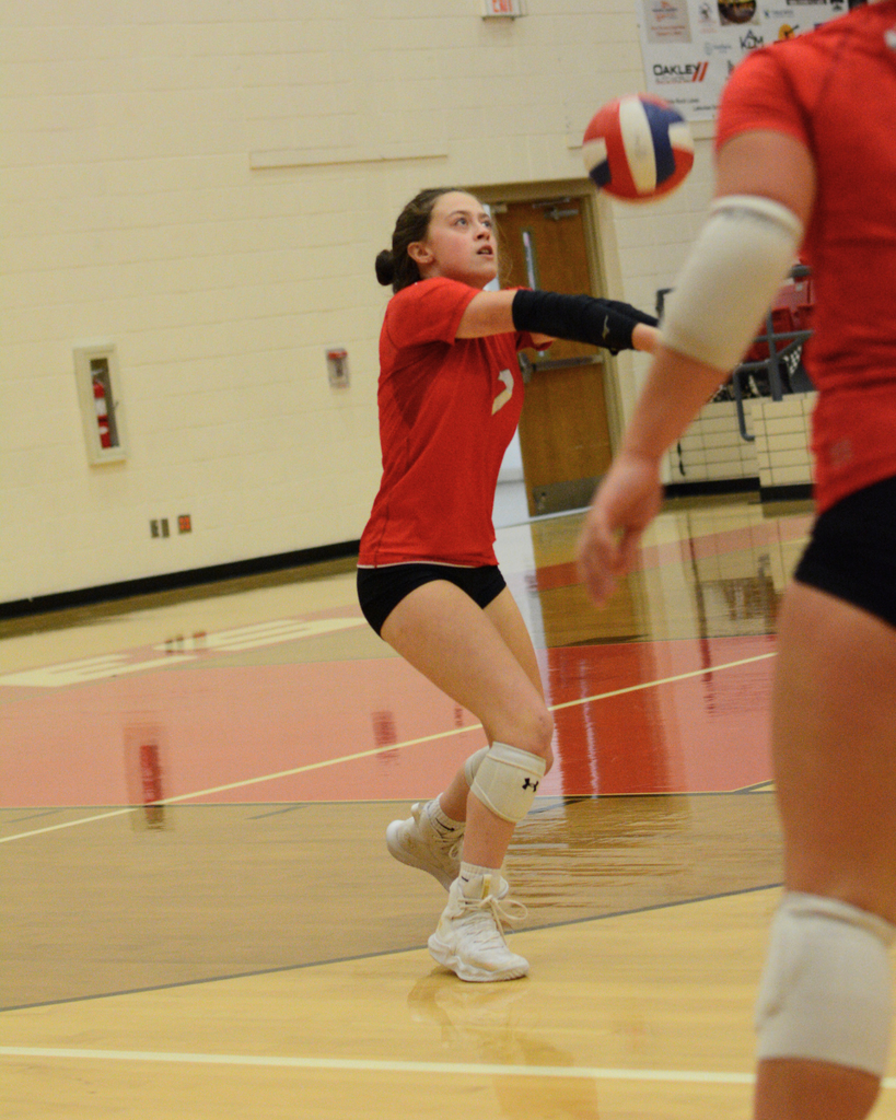 Maddie bumping the volleyball