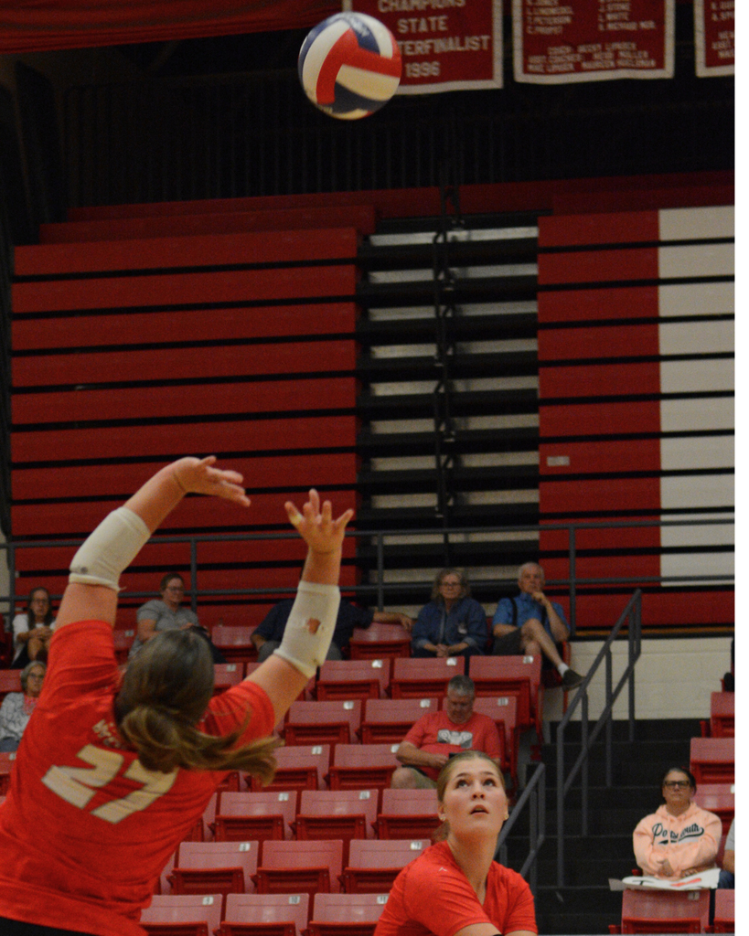 Chloe setting the volleyball