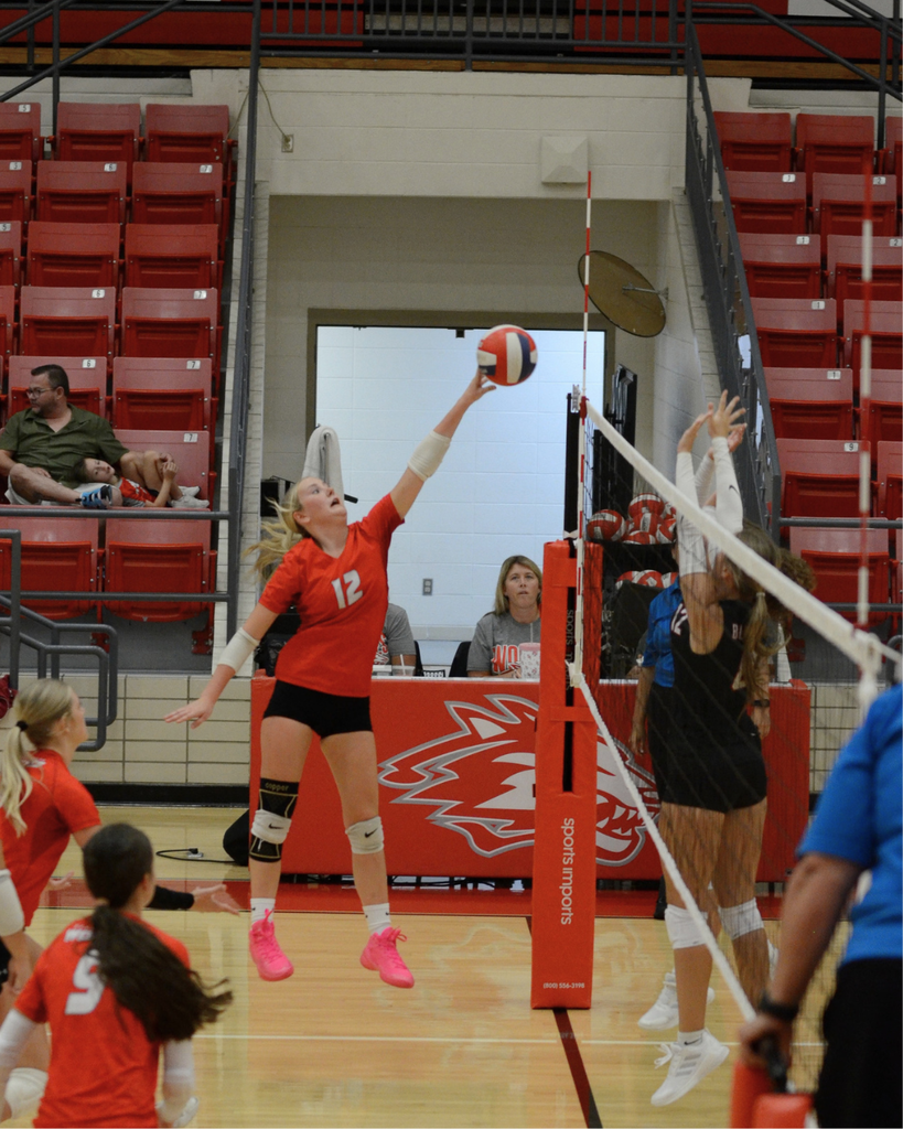 Kaelee tipping the volleyball