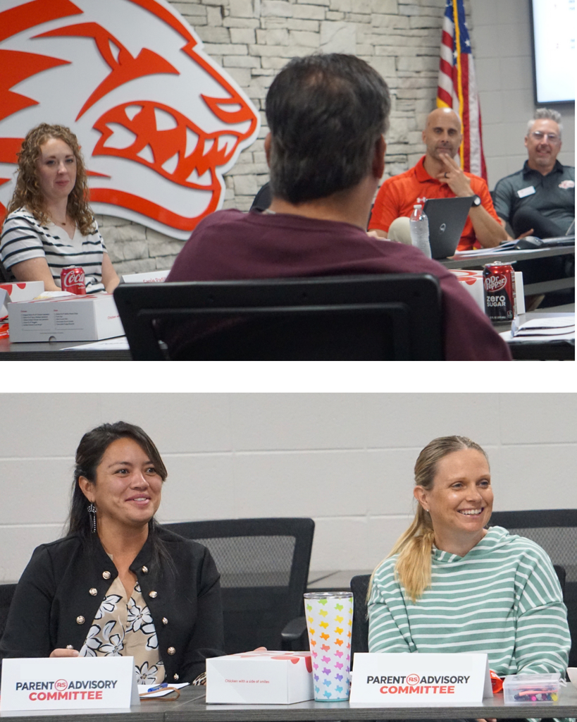 Parents talking at advisory meeting