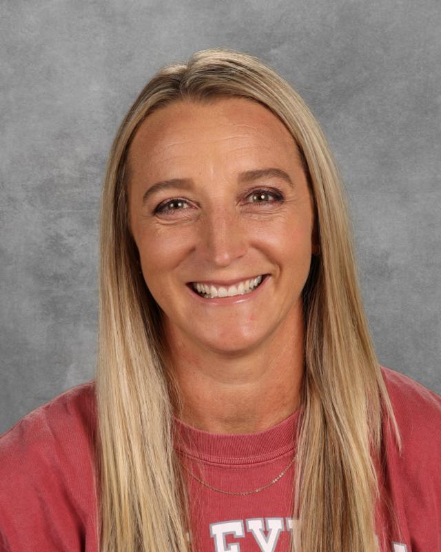 woman in red shirt smiling