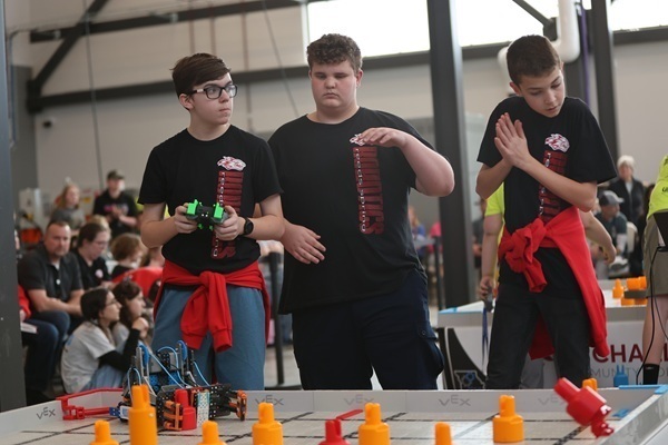 3 students driving robot