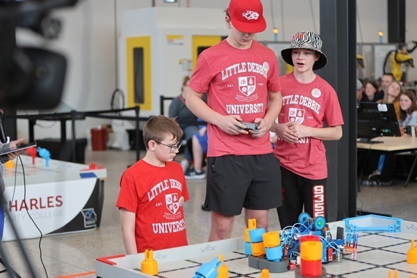 3 students driving robot