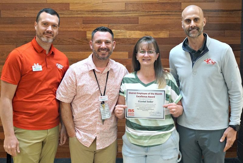 Group photo of Garet Nunan, Brandon Weldy, Crystal Seiler, and Dr. Cody Hirschi