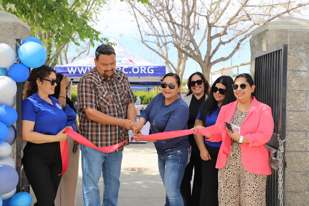 KC Family Engagement Center Grand Opening Ribbon Cutting FEC staff, RSUSD admin and board members cutting ribbon