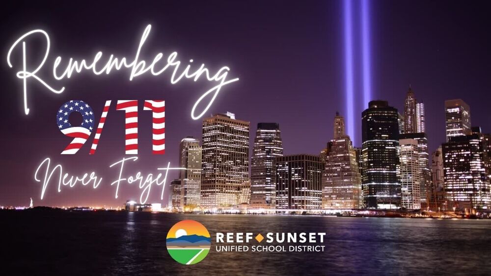 RSUSD 9/11 Remembering New York Skyline over the water beaming lights