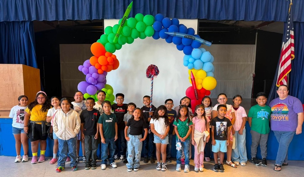 KCES students with teacher during rally