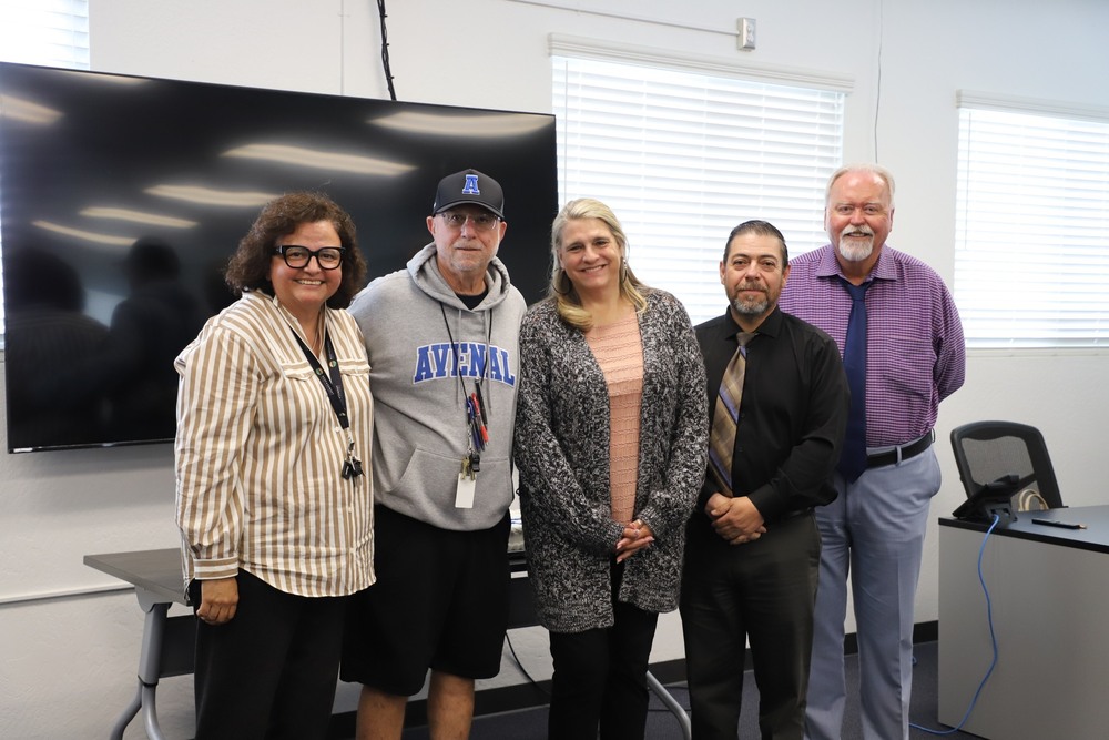 RSUSD admin with Mr. Earls picture