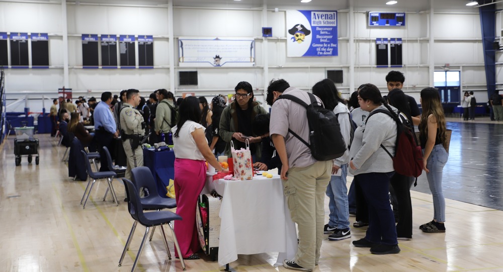 AHS Career Expo students and table leaders in the gym