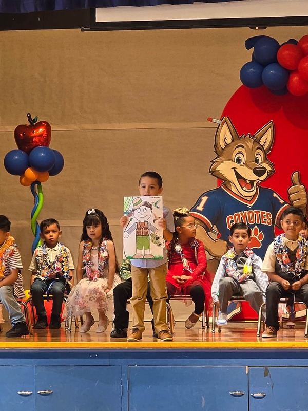 KCES kinder promotion student on stage