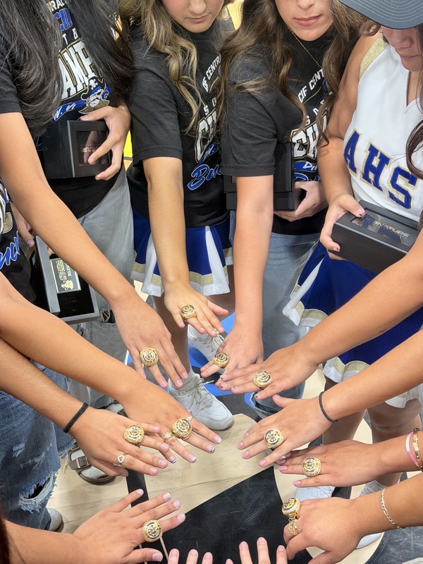 ahs softball players with championship rings