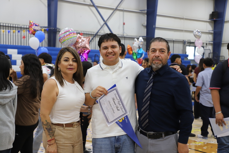 ahs honor roll recipient with family